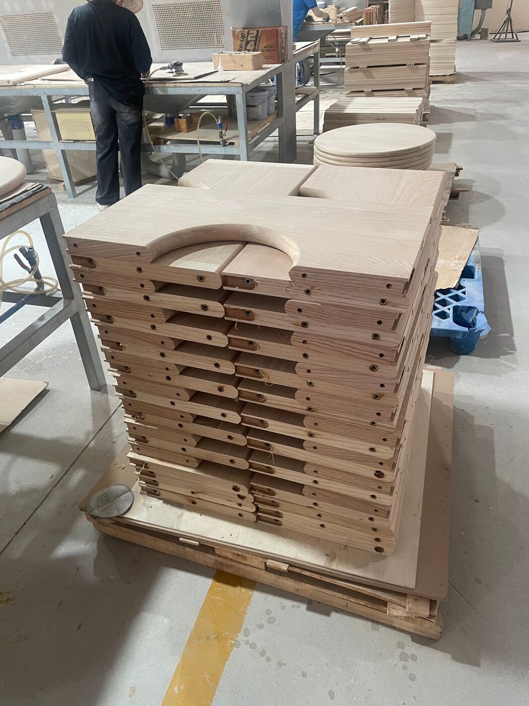 Stack of finished oak components on a pallet on the factory floor