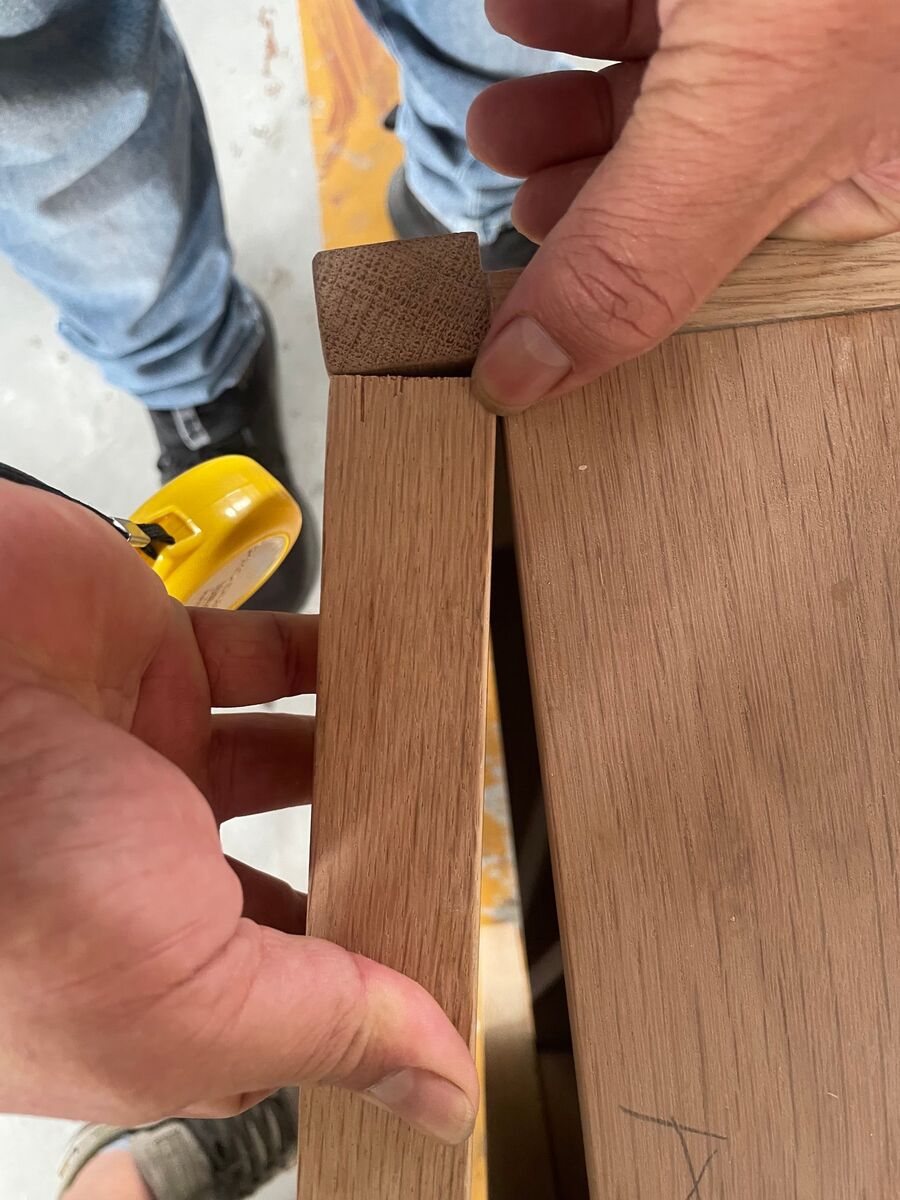 Cabinet door hitting the leg when opened
